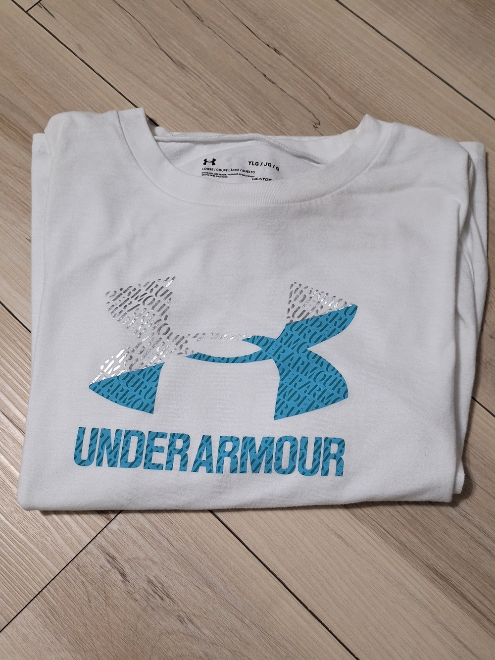 Under Armour Girls White Long Sleeve Tee with Blue and Silver Logo